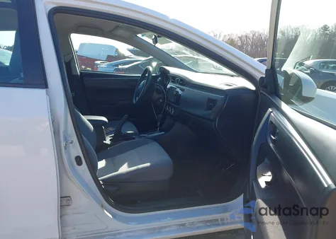 2016 Toyota Corolla L z USA, uszkodzony, nr VIN 2T1BURHE6GC735115